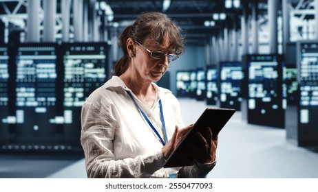 Senior programmer working in data center housing GPU dedicated server cabinets that can process artificial intelligence tasks with high efficiency, fixing defective machines used for machine learning