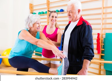 Senior At Rehab In Physical Therapy Having Rehabilitation Session