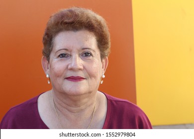 
Senior Retired Woman Looking At Camera 