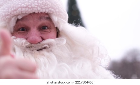 Senior Santa Claus With A Big White Beard, Showing Thumbs Up, Handsome Happy Man