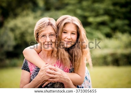 Similar – Senior woman in a wheelchair with daughter in garden