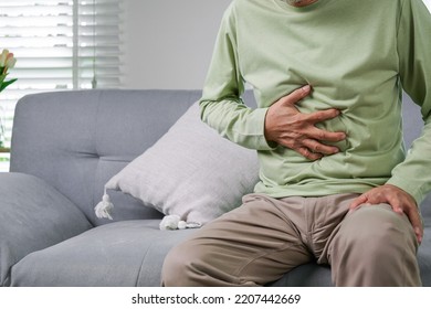 Senior Stomach Pain, Pain In The Stomach, Elderly With Stomach Ache. Elderly Upset Stomach, Senior Constipation Hand Touch Abdomen. Senior Man Feeling Suffer From Terrible Stomachache. Unhealthy