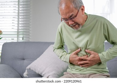 Senior Stomach Pain, Pain In The Stomach, Elderly With Stomach Ache. Elderly Upset Stomach, Senior Constipation Hand Touch Abdomen. Senior Man Feeling Suffer From Terrible Stomachache. Unhealthy