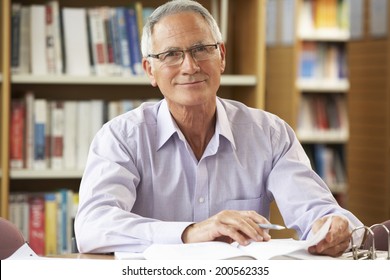 Senior Student Working In Library