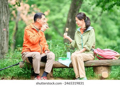 Senior trekking image of eating lunch - Powered by Shutterstock