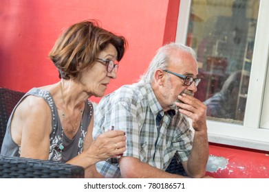 Senior Turkish Couple Having A Deep Conversation At The Cafe In Eskisehir.