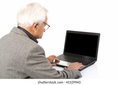 senior using laptop