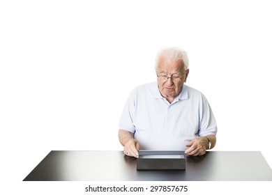 Senior using a tablet computer