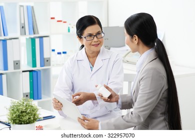 Senior Vietnamese Pharmacist Explaining Effects Drug Stock Photo ...