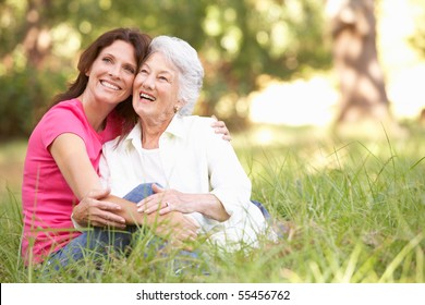 Senior Woman With Adult Daughter In Park