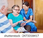 Senior woman, card game and nurse in retirement home for fun with recreational activities with friends or roommates. Smile, caregiver and assistance with pensioner in living room with happiness.