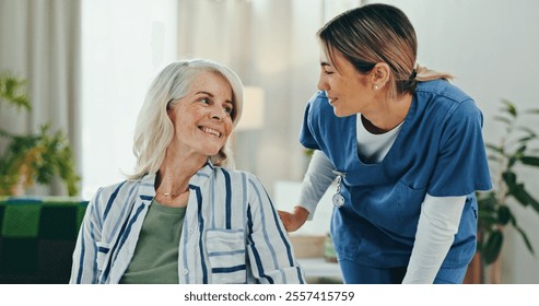 Senior woman, caregiver and smile with discussion for healthcare, comfort and treatment in elderly care at home. People, nurse and communication for help, conversation and checkup in retirement