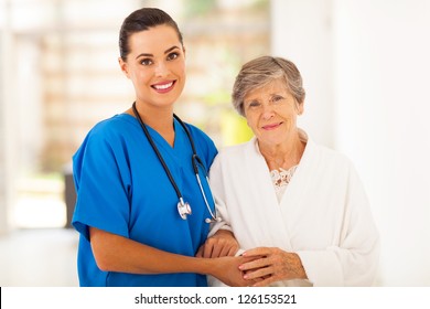 Senior Woman And Caring Young Nurse