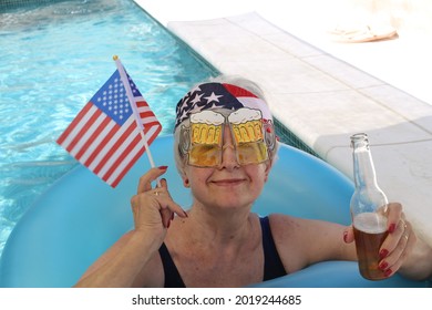 Senior woman celebrating an American holiday in swimming pool  