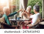 Senior woman, cheers and friends in restaurant for wine, vacation and retirement together with happy. Elderly people, reunion and relax in diner for drinks, toast and social celebration with memory