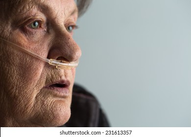 Senior woman with Chronic obstructive pulmonary disease with supplemental oxygen - Powered by Shutterstock