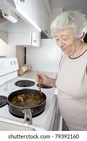 Senior woman cooking