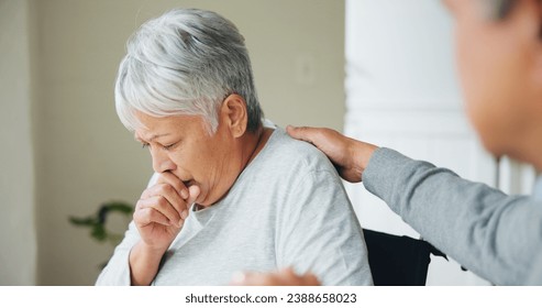 Senior, woman and cough sick support or husband hug in home for concern, empathy or winter virus. Old person, man and comfort for bacteria infection or flu disease retirement or allergy, risk in pain - Powered by Shutterstock