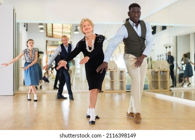 Senior Woman Dancing Swing In Studio