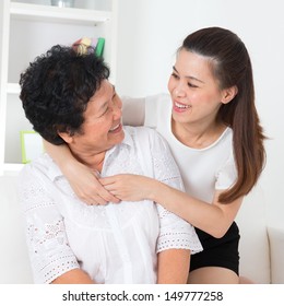 Senior Woman And Daughter. Happy Asian Family Senior Mother And Adult Offspring Having Fun Time At Home.