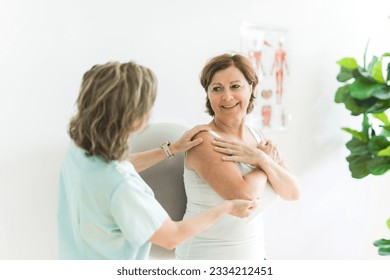 A Senior woman do wall squats with fit ball - Powered by Shutterstock