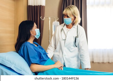 Senior Woman Doctor Wearing Protective Mask With Stethoscope Service Help Support Discussing And Consulting Talk To Sick Woman Patient About Checkup Result Information  In Hospital