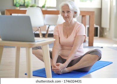 Senior Woman Doing Fitness Exercises From Home- Virtual Classes