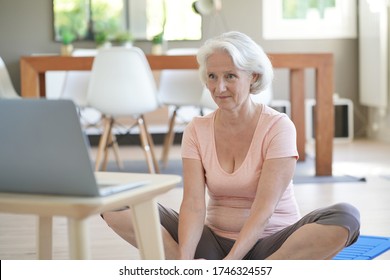 Senior Woman Doing Fitness Exercises From Home- Virtual Classes