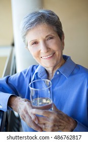 Senior Woman Drinking Water.