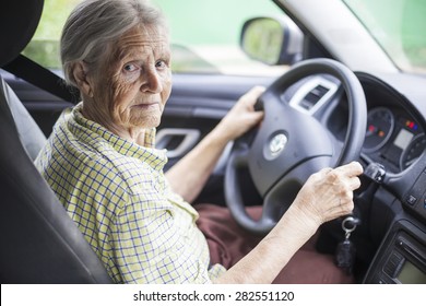 Senior Woman Driving A Car