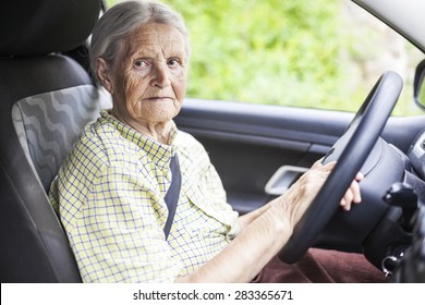 Senior Woman Driving A Car