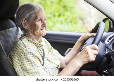 Senior Woman Driving A Car