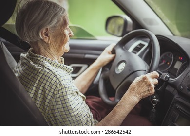 Senior Woman Driving A Car