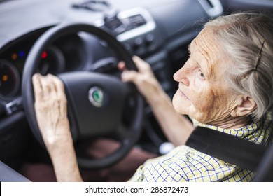 Senior Woman Driving A Car