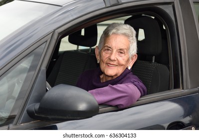 Senior Woman Driving A Car