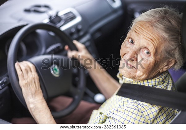 Senior woman driving a
car