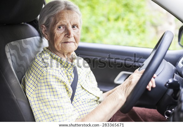 Senior woman driving a
car