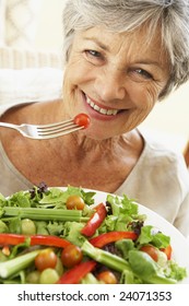 Senior Woman Eating Healthy Salad