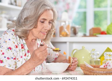 Senior Woman Eating Soup