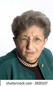 senior woman elderly with skeptical questioning look on her face