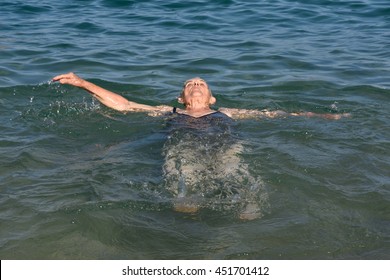 Senior Woman Enjoying Of Backstroke