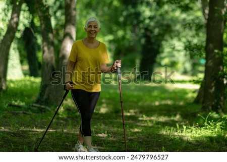 Similar – Active and sporty woman runner in autumn nature