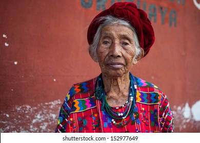 Senior Woman In Ethnic Traditional Latin American Dress. Travel Background For Guatemala.