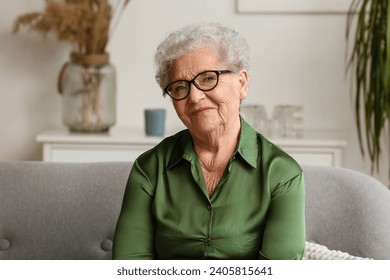 Senior woman in eyeglasses at home - Powered by Shutterstock