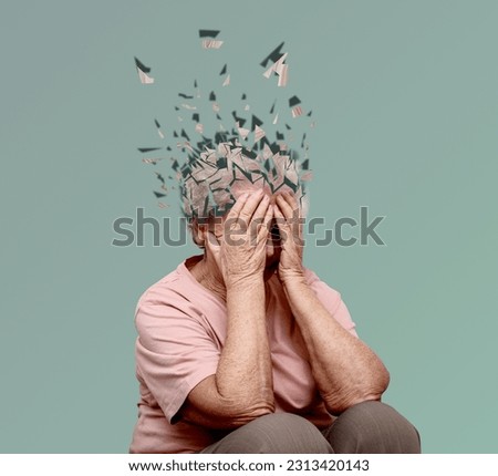Senior woman with flying pieces from her head symbolizing amnesia on dusty light blue background