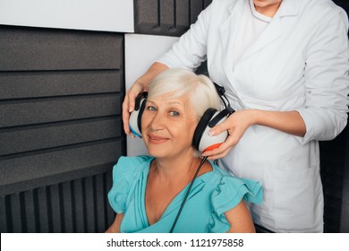 Senior Woman Getting A Hearing Test At A Doctors Office, Audiometer Hearing Test