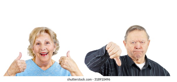 Senior woman giving two thumbs up and grumpy man thumb down