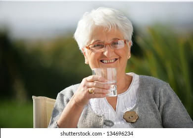 Senior Woman With A Glass Of Water