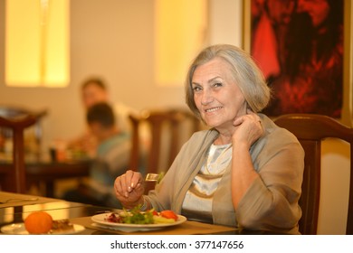 Senior Woman Having Dinner