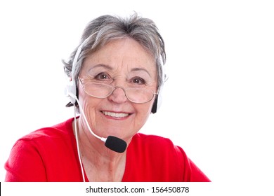 Senior Woman With Headset Must Still Working In Her Pension.